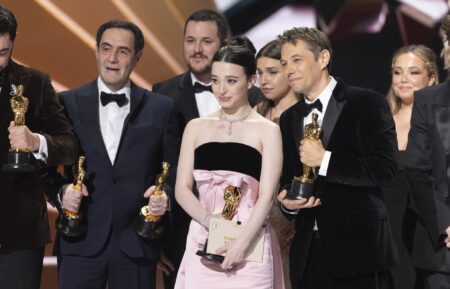 Mikey Madison and Sean Baker with the rest of Anora at Oscars 2025